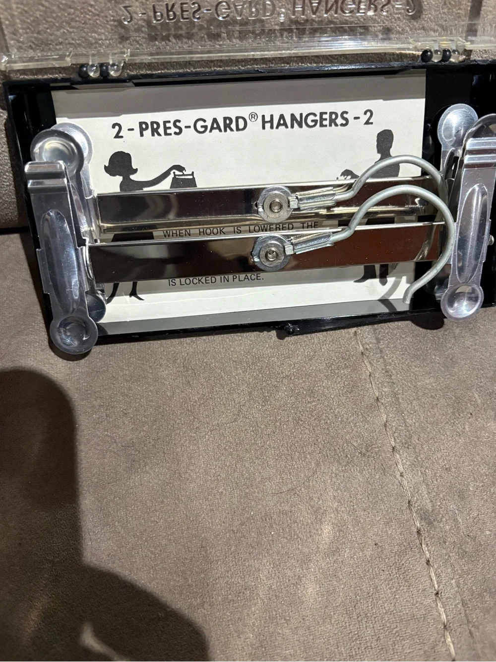 Unisex vintage Pres-Gard Hangers.
